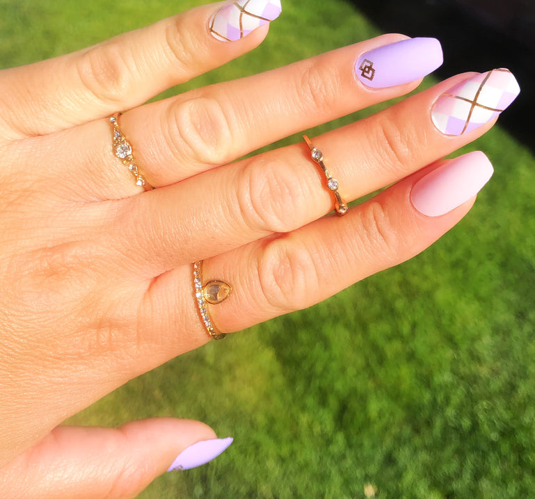 Pastel Pink and purple nails with argyle accent nail